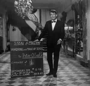 Peter O'Toole in a scene from - How to Steal a Million Dollars and Live Happily Ever After - in France. (AP file photo)</em>
</div) Peter O'Toole in a scene from - How to Steal a Million Dollars and Live Happily Ever After - in France. (AP file photo)</em>
</div)