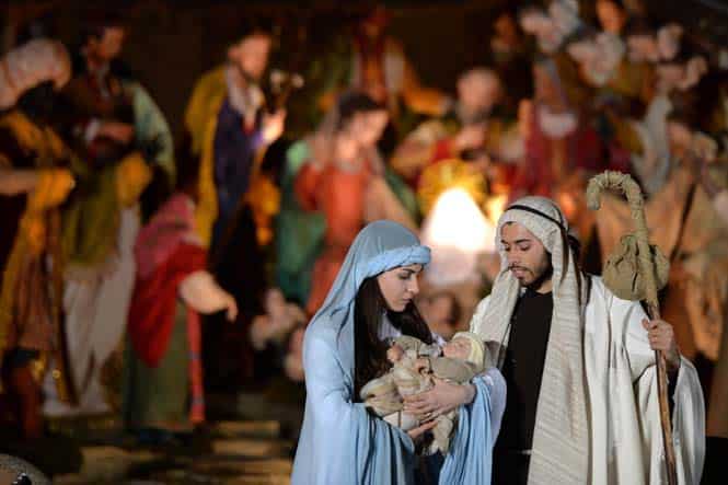 People play a nativity scene during the unveiling ceremony of the crib in St Peter's Square at the Vatican on Christmas eve. (AFP)</font></em></strong) People play a nativity scene during the unveiling ceremony of the crib in St Peter's Square at the Vatican on Christmas eve. (AFP)</font></em></strong)