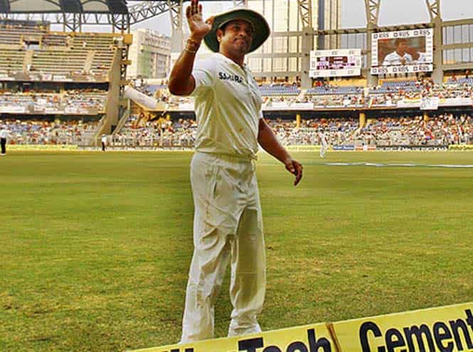 Sachin Tendulkar waves at the crowd during his final Test at Wankhede Stadium. (PTI file photo)