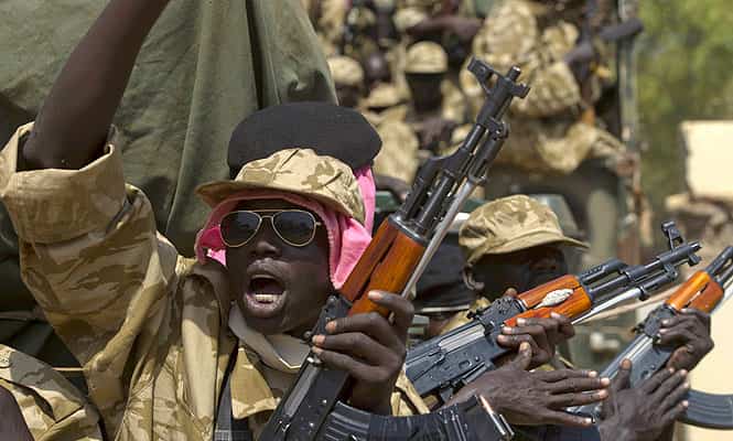 A SPLA soldier gestures as he sits in a vehicle in Juba. African mediators sought on Saturday to meet rivals to South Sudan's president in a bid to end fighting that threatens to drag the world's newest country into an ethnic civil war. Reuters A SPLA soldier gestures as he sits in a vehicle in Juba. African mediators sought on Saturday to meet rivals to South Sudan's president in a bid to end fighting that threatens to drag the world's newest country into an ethnic civil war. Reuters