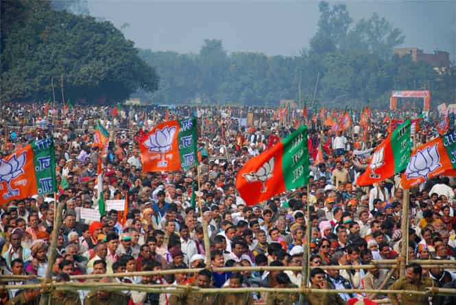 Crowd at BJP PM candidate Narendra Modi's election campaign rally in Varanasi. (PTI photo)</em) Crowd at BJP PM candidate Narendra Modi's election campaign rally in Varanasi. (PTI photo)</em)