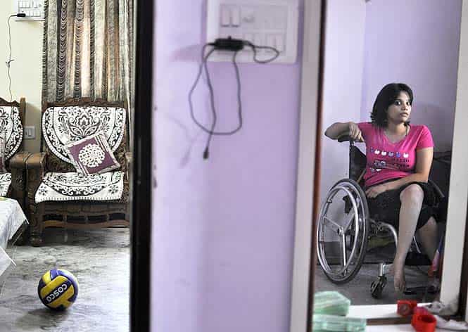 Riya, 19, became quadriplegic when she dived into the shallow side of the swimming pool in her school. She was 14 then. (Saumya Khandelwal/ HT Photos)</em></strong) Riya, 19, became quadriplegic when she dived into the shallow side of the swimming pool in her school. She was 14 then. (Saumya Khandelwal/ HT Photos)</em></strong)