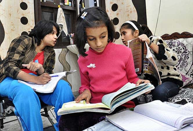 Spending a majority of her time at home, she engages herself by tutoring school children. (Saumya Khandelwal/ HT Photos)</em></strong) Spending a majority of her time at home, she engages herself by tutoring school children. (Saumya Khandelwal/ HT Photos)</em></strong)