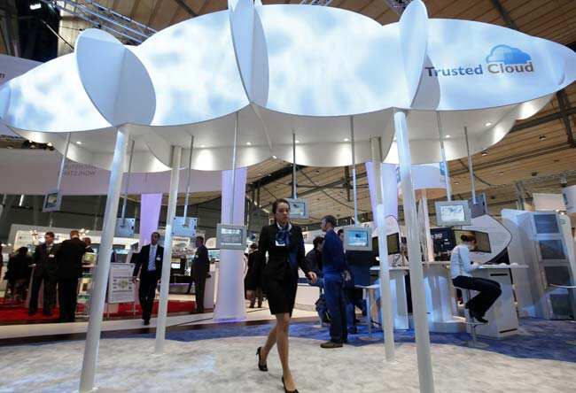 A visitor walks under a model symbolising a cloud at the booth of Germany's ministry of economy on the CeBit computer fair in Hanover. Reuters/Fabrizio Bensch A visitor walks under a model symbolising a cloud at the booth of Germany's ministry of economy on the CeBit computer fair in Hanover. Reuters/Fabrizio Bensch