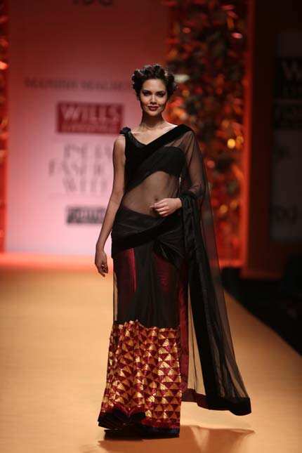 Esha Gupta walks the ramp for Manish Malhotra at WIFW, New Delhi on March 15, 2013. Esha Gupta walks the ramp for Manish Malhotra at WIFW, New Delhi on March 15, 2013.