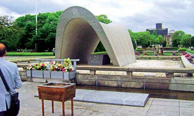 Remember forever: The cenotaph (above) at the Peace Memorial Park; a geisha) Remember forever: The cenotaph (above) at the Peace Memorial Park; a geisha)