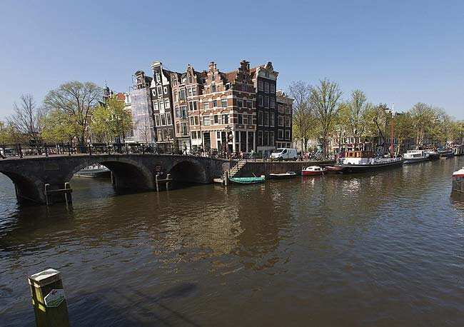 A view of one of the most photographed buildings at the intersection of Prinsengracht and Brouwersgracht canal in Amsterdam. Reuters/Michael Kooren