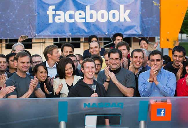 Facebook founder, Chairman and CEO Mark Zuckerberg, center, rings the opening bell of the Nasdaq stock market, from Facebook headquarters in Menlo Park, Calif. Photo:AP/Nasdaq via Facebook, Zef Nikolla Facebook founder, Chairman and CEO Mark Zuckerberg, center, rings the opening bell of the Nasdaq stock market, from Facebook headquarters in Menlo Park, Calif. Photo:AP/Nasdaq via Facebook, Zef Nikolla