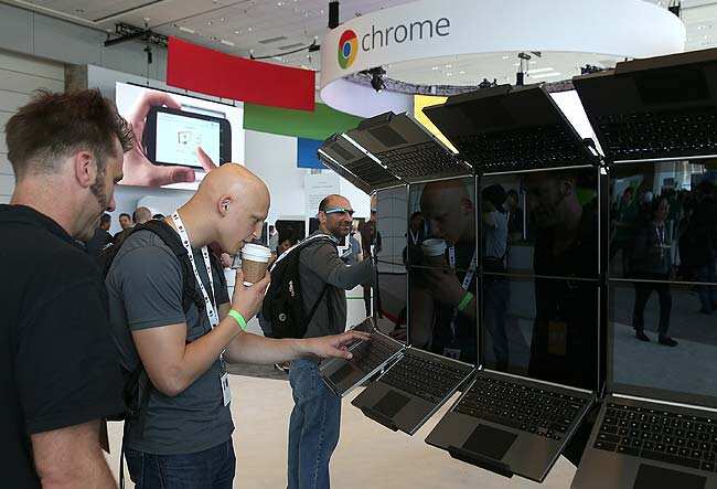 Attendees inspect a display of Google Chromebook Pixel laptops during the Google I/O developers conference at the Moscone Center in San Francisco, California. Justin Sullivan/Getty Images/AFP Attendees inspect a display of Google Chromebook Pixel laptops during the Google I/O developers conference at the Moscone Center in San Francisco, California. Justin Sullivan/Getty Images/AFP