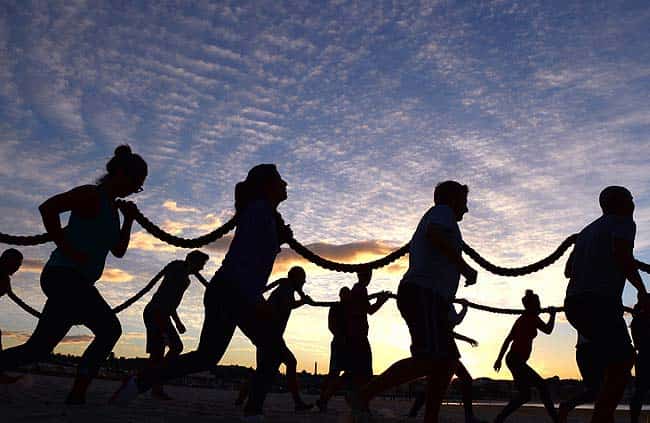 Boot camp enthusiasts work out on Sydney's iconic Bondi Beach. Photo: AFP/William West Boot camp enthusiasts work out on Sydney's iconic Bondi Beach. Photo: AFP/William West