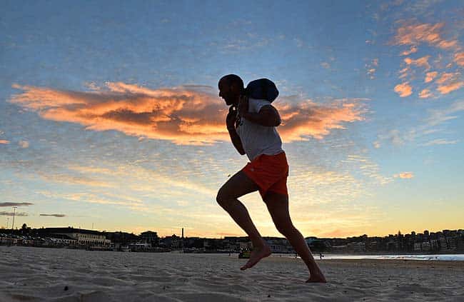 Boot camp enthusiasts work out on Sydney's iconic Bondi Beach. Photo: AFP/William West Boot camp enthusiasts work out on Sydney's iconic Bondi Beach. Photo: AFP/William West