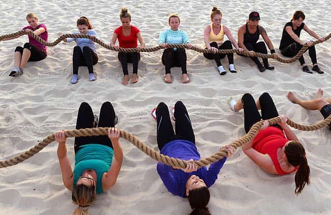 Boot camp enthusiasts work out on Sydney's iconic Bondi Beach. Photo: AFP/William West Boot camp enthusiasts work out on Sydney's iconic Bondi Beach. Photo: AFP/William West