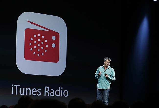 Eddy Cue, Apple senior vice president of internet software and services, introduces iTunes Radio during Apple Worldwide Developers Conference (WWDC) 2013 in San Francisco, California. REUTERS/Stephen La) Eddy Cue, Apple senior vice president of internet software and services, introduces iTunes Radio during Apple Worldwide Developers Conference (WWDC) 2013 in San Francisco, California. REUTERS/Stephen La)
