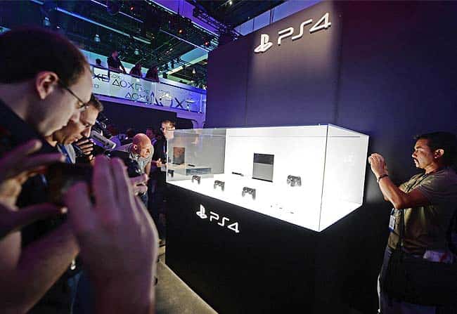 Attendees photograph the new Sony PlayStation 4 (PS4) console on the first day of the Electronic Entertainment Expo (E3) in Los Angeles, California. Photo: AFP / Robyn Bec) Attendees photograph the new Sony PlayStation 4 (PS4) console on the first day of the Electronic Entertainment Expo (E3) in Los Angeles, California. Photo: AFP / Robyn Bec)