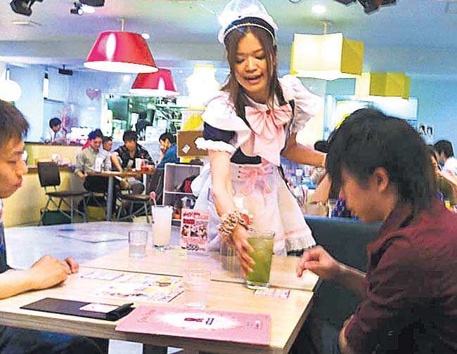 A maid-café, where girls dressed in maid frills stoke the egos of ‘nerds and geeks’ A maid-café, where girls dressed in maid frills stoke the egos of ‘nerds and geeks’