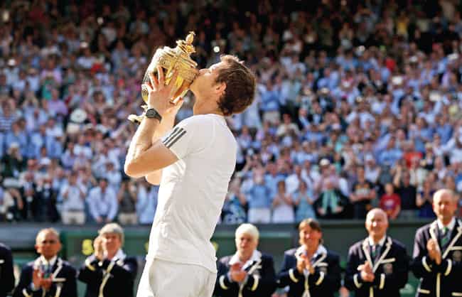Winner Andy Murray kisses the trophy. Winner Andy Murray kisses the trophy.