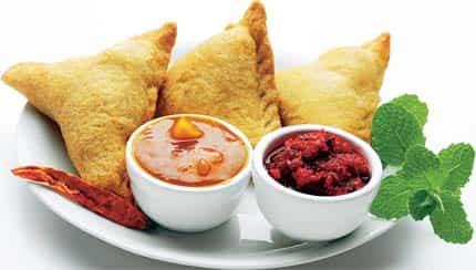 A samosa absorbs less oil than we think because it is surface fried