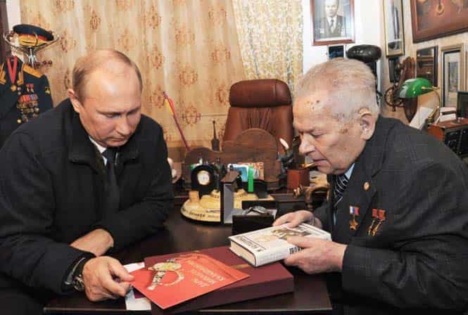 Russian President Vladimir Putin speaks with Mikhail Kalashnikov (R), the Russian inventor of the globally popular AK-47 assault rifle in Izhevsk. (AFP Photo)
</div) Russian President Vladimir Putin speaks with Mikhail Kalashnikov (R), the Russian inventor of the globally popular AK-47 assault rifle in Izhevsk. (AFP Photo)
</div)