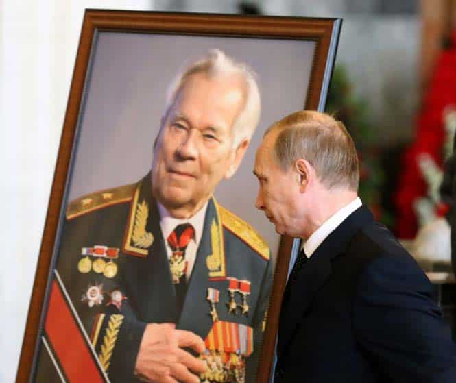 Russian President Vladimir Putin walks past a portrait of Mikhail Kalashnikov, the designer of the iconic AK-47 assault rifle during his funeral ceremony in Mytishchi outside Moscow. (AFP Photo)
</div) Russian President Vladimir Putin walks past a portrait of Mikhail Kalashnikov, the designer of the iconic AK-47 assault rifle during his funeral ceremony in Mytishchi outside Moscow. (AFP Photo)
</div)