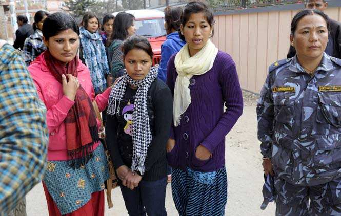 Jayarani Tharu after being rescued from her workplace by police and activists in Kathmandu. (AFP)</strong) Jayarani Tharu after being rescued from her workplace by police and activists in Kathmandu. (AFP)</strong)