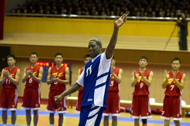 Dennis Rodman waves to North Korean leader Kim Jong Un, seated above in the stands, after singing Happy Birthday to Kim before an exhibition basketball game in Pyongyang, North Korea. (AP)</font></em></strong) Dennis Rodman waves to North Korean leader Kim Jong Un, seated above in the stands, after singing Happy Birthday to Kim before an exhibition basketball game in Pyongyang, North Korea. (AP)</font></em></strong)
