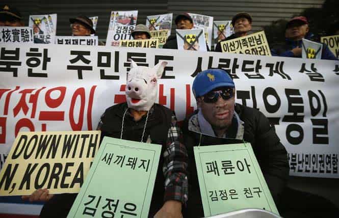 Protesters wearing masks depicting former US basketball star Dennis Rodman and a pig signifying North Korean leader Kim Jong Un, attend a rally denouncing Rodman's visit to North Korea in Seoul. (Reuters)</font></em></strong) Protesters wearing masks depicting former US basketball star Dennis Rodman and a pig signifying North Korean leader Kim Jong Un, attend a rally denouncing Rodman's visit to North Korea in Seoul. (Reuters)</font></em></strong)