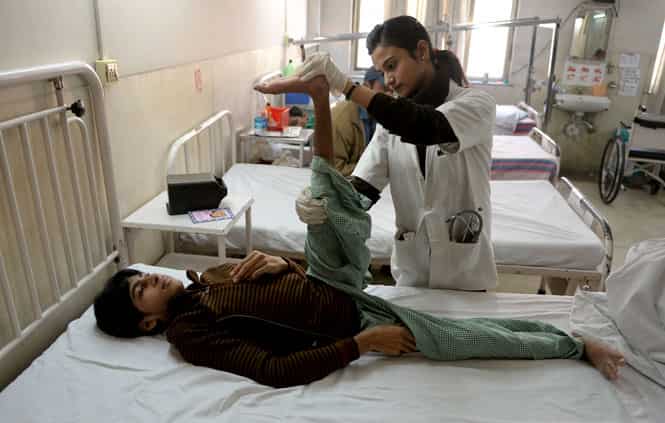 A Polio patient receives treatment from a hospital in New Delhi. (AFP Photo)
</div) A Polio patient receives treatment from a hospital in New Delhi. (AFP Photo)
</div)