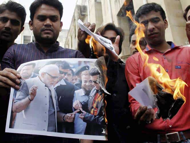 Ahmedabad: NSUI members holding a protest against Bollywood actor Salman Khan for his meeting with Gujarat Chief Minister Narendra Modi in Ahmedabad on Wednesday. (PTI Photo)