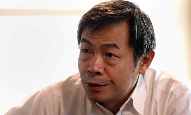 Chinese multi-millionaire Zhang Yue at his office in the Broad Sustainable Building in Changsha, China's Hunan province. (AFP Photo)
</div) Chinese multi-millionaire Zhang Yue at his office in the Broad Sustainable Building in Changsha, China's Hunan province. (AFP Photo)
</div)