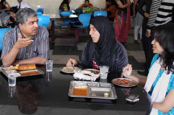Nandan Nilekani interacts with students of Christ College in Bangalore. (PTI photo)</strong) Nandan Nilekani interacts with students of Christ College in Bangalore. (PTI photo)</strong)