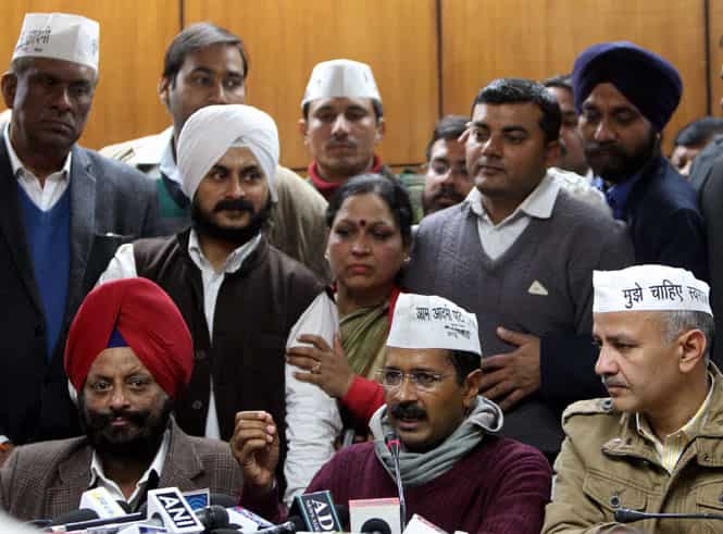 Delhi CM Arvind Kejriwal with party members addresses media after winning the trust vote in Delhi assembly. (PTI photo)</em) Delhi CM Arvind Kejriwal with party members addresses media after winning the trust vote in Delhi assembly. (PTI photo)</em)