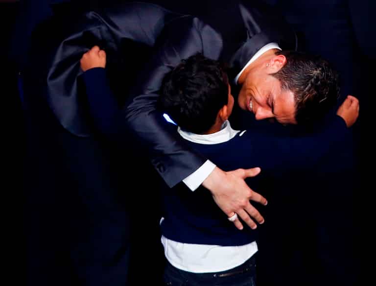 Ronaldo celebrates with his son Cristiano Ronaldo Junior after receiving the 2013 FIFA Ballon d'Or award for player of the year in Zurich. (AFP photo)</strong) Ronaldo celebrates with his son Cristiano Ronaldo Junior after receiving the 2013 FIFA Ballon d'Or award for player of the year in Zurich. (AFP photo)</strong)
