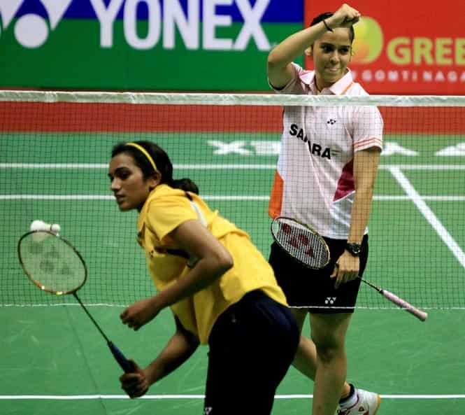 Saina Nehwal celebrates after winning the women title of Syed Modi International India Grand Prix Gold Badminton Championship. (PTI)</font></strong) Saina Nehwal celebrates after winning the women title of Syed Modi International India Grand Prix Gold Badminton Championship. (PTI)</font></strong)