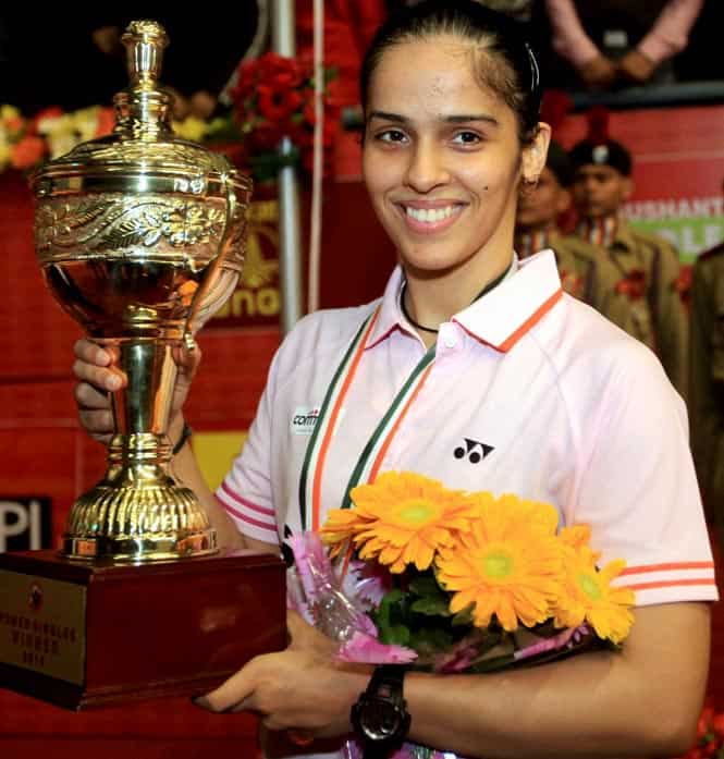 Saina Nehwal with the trophy in the women title of Syed Modi Inaternational India Grand Prix Gold Badminton Championship. (PTI Photo)</font></strong) Saina Nehwal with the trophy in the women title of Syed Modi Inaternational India Grand Prix Gold Badminton Championship. (PTI Photo)</font></strong)