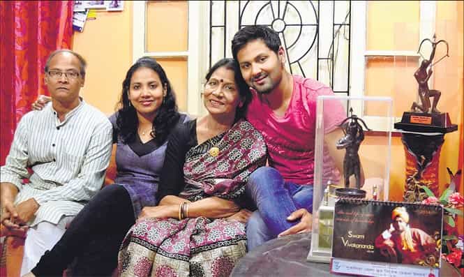Both Dola and Rahul’s Arjuna Awards are on display in the living room where the Banerjees pose for a family snap, with father Ashok and mother Kalpana. (Prateek Choudhury/HT Photos) Both Dola and Rahul’s Arjuna Awards are on display in the living room where the Banerjees pose for a family snap, with father Ashok and mother Kalpana. (Prateek Choudhury/HT Photos)