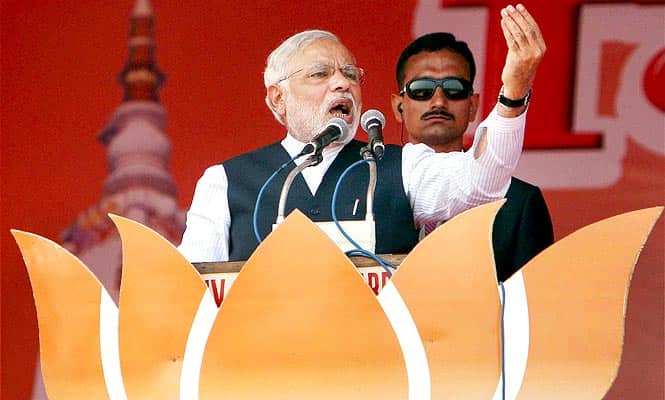 A file photo of BJP PM candidate Narendra Modi addressing a rally in New Delhi. (PTI photo)
</div) A file photo of BJP PM candidate Narendra Modi addressing a rally in New Delhi. (PTI photo)
</div)