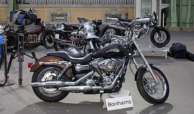 The Harley gifted to Pope Francis last year and signed by him on its tank, is displayed ahead of Bonham's sale of vintage and classic cars, at the Grand Palais in Paris (AP Photo) The Harley gifted to Pope Francis last year and signed by him on its tank, is displayed ahead of Bonham's sale of vintage and classic cars, at the Grand Palais in Paris (AP Photo)