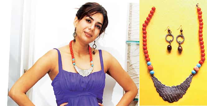 BARGAIN PRICE: This dress from River Island and the necklace cost Karishma Kapoor Rs 3,000 in all. BARGAIN PRICE: This dress from River Island and the necklace cost Karishma Kapoor Rs 3,000 in all.