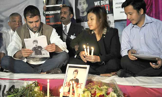 Congress vice-president Rahul Gandhi joins students from the northeast at Jantar Mantar during a protest demanding justice for an Arunachal Pradesh student who died after a scuffle in New Delhi. (Vipin Kumar/ HT Photo) </strong)