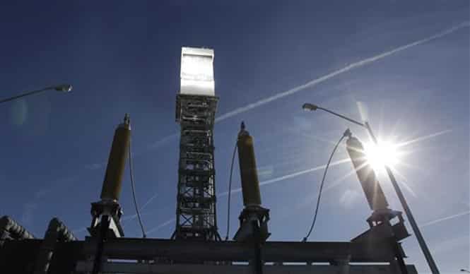 A boilers sits on 459-foot towers vents steam. The Ivanpah Solar Electric Generating System, sprawling across roughly 5 square miles of federal land near the California-Nevada border. (AP Photo) A boilers sits on 459-foot towers vents steam. The Ivanpah Solar Electric Generating System, sprawling across roughly 5 square miles of federal land near the California-Nevada border. (AP Photo)
