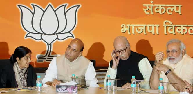 BJP chief Rajnath Singh, PM candidate Narendra Modi, LK Advani and Sushma Swaraj during party's central election committee meeting in New Delhi. (PTI photo)</strong) BJP chief Rajnath Singh, PM candidate Narendra Modi, LK Advani and Sushma Swaraj during party's central election committee meeting in New Delhi. (PTI photo)</strong)
