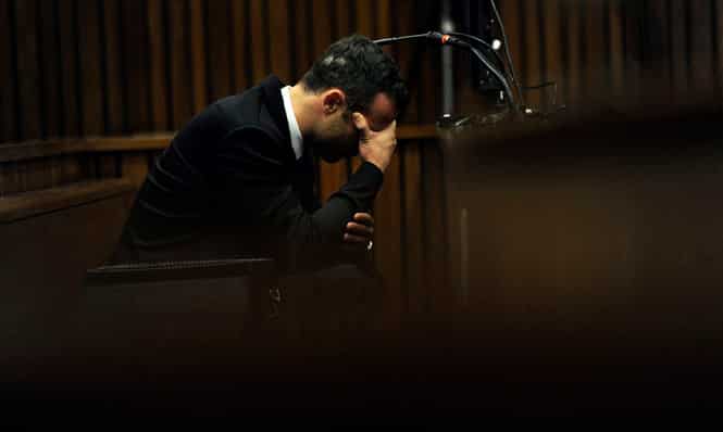 Olympic and Paralympic track star Oscar Pistorius reacts during the fourth day of his trial for the murder of his girlfriend Reeva Steenkamp. (Reuters Photo) Olympic and Paralympic track star Oscar Pistorius reacts during the fourth day of his trial for the murder of his girlfriend Reeva Steenkamp. (Reuters Photo)