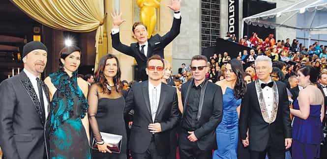 The Sherlock star photo-bombs U2. The Sherlock star photo-bombs U2.