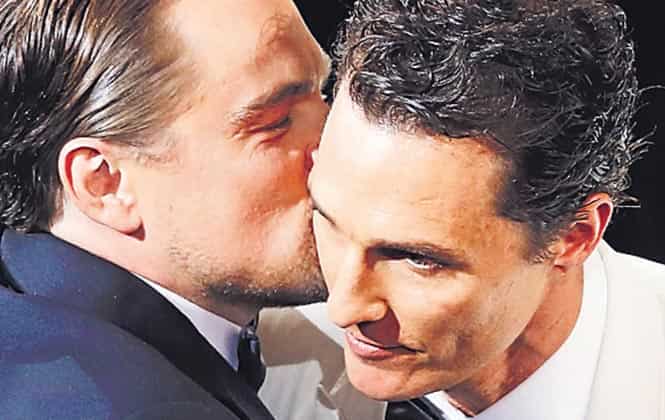 Kiss and don't tell: Leonardo DiCaprio and Matthew McConaughey. Kiss and don't tell: Leonardo DiCaprio and Matthew McConaughey.