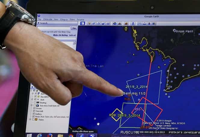 A map of a flight plan is seen on a computer screen during a meeting before a mission to find the Malaysia Airlines flight MH370 that disappeared from radar screens. (Reuters photo)</em)