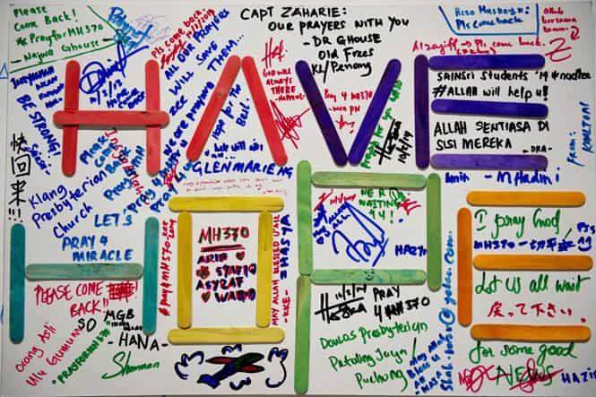 A poster carrying messages for the passengers of the missing Malaysia Airlines Boeing 777-200 plane is seen at the Kuala Lumpur International Airport (KLIA) in Sepang on March 10, 2014.(AFP Photo) A poster carrying messages for the passengers of the missing Malaysia Airlines Boeing 777-200 plane is seen at the Kuala Lumpur International Airport (KLIA) in Sepang on March 10, 2014.(AFP Photo)