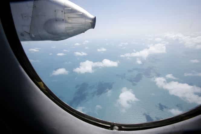 Clouds hover outside the window of a Vietnam Air Force search and rescue aircraft An-26 on a mission to find the missing Malaysia Airlines flight MH370, off Vietnam's Tho Chu island. (Reuters Photo) Clouds hover outside the window of a Vietnam Air Force search and rescue aircraft An-26 on a mission to find the missing Malaysia Airlines flight MH370, off Vietnam's Tho Chu island. (Reuters Photo)