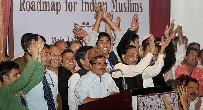 Aam Aadmi Party (AAP) chief Arvind Kejriwal addressing a national conference on road map for Indian Muslims in New Delhi. (PTI photo)</em)