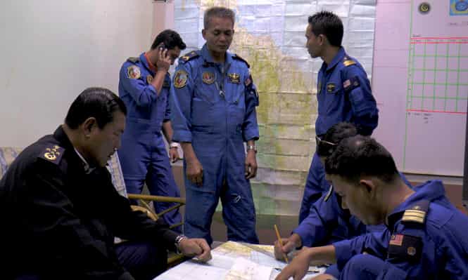 Malaysian Maritime Enforcement Agency, Director General of the Malaysian Maritime Enforcement Agency Admiral Mohd Amdan Kurish briefs his officers before the start of searching for the missing Malaysia Airlines plane at Pasir Puteh in Malaysia. (AP file photo)</strong) Malaysian Maritime Enforcement Agency, Director General of the Malaysian Maritime Enforcement Agency Admiral Mohd Amdan Kurish briefs his officers before the start of searching for the missing Malaysia Airlines plane at Pasir Puteh in Malaysia. (AP file photo)</strong)