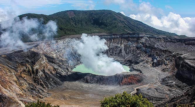 The Poás Volcano in Costa Rica offers an unparalleled view over the Caribbean Sea The Poás Volcano in Costa Rica offers an unparalleled view over the Caribbean Sea